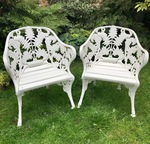 Antique cast iron chairs
